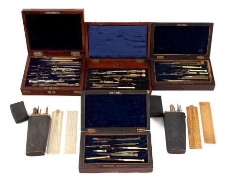 4 wooden boxes with various measuring and drawing tools and 2 tubes, not complete but many parts. England approx. 1870. Large