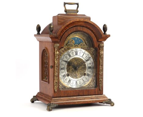Hermle table clock with moon phase, in oak case 29 cm high