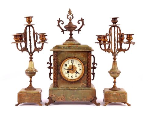 Marked Vincent, French onyx pendulum 42 cm high and 2 5-light candlesticks 38 cm high
