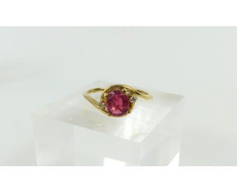 A ruby and diamond twist ring, the oval ruby in a four claw setting, with a small diamond to each side, indistinctly marked, 