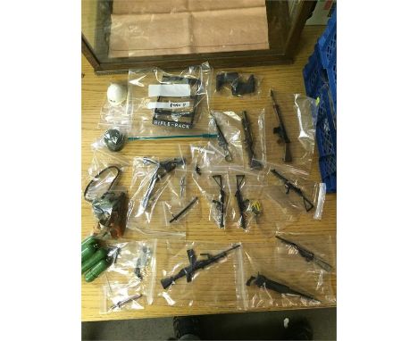 A selection of vintage Action Man small arms to include, a Lugar, 1911 Colt, a revolver, dagger, Bren, bayonets in sheaths, a