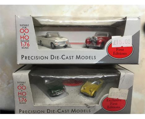 Two boxed sets of two 1:76 scale cars by Exclusive First Editions