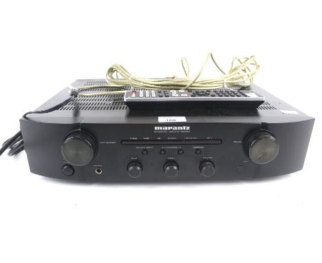 A Marantz amplifier. Model PM6004, s/n. 15001150005800 with remote. Condition Report: Unable to verify whether it's functioni