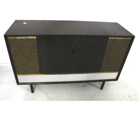 A DECCA radiogram model S.R.G. 707. With Garrard turntable and three band radio. L107cm x D36cm x H72cm