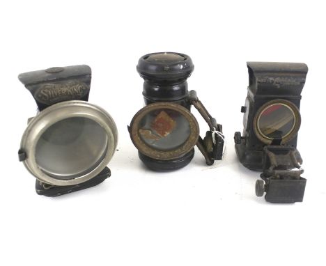 Three vintage bicycle lamps. Including a Jos Lucas Ltd 'Silver King' example