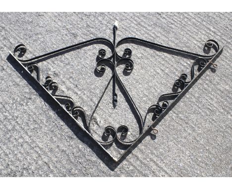 A vintage black painted metal shop sign bracket. L100cm x H100cm