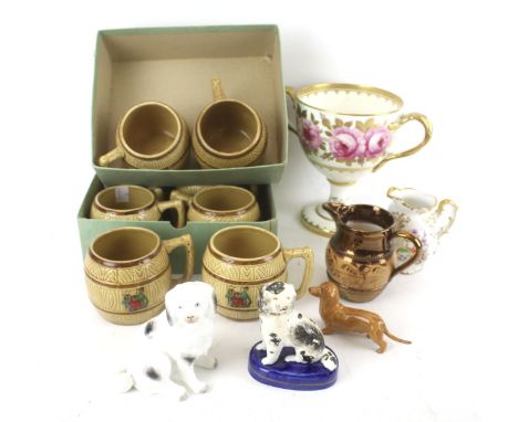 A collection of early 19th century and later ceramics. To include a small Staffordshire dog; a campana shaped vase decorated 