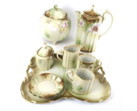 A vintage Japanese blush tea service. Marked 'Aichi' including tray, two cups and saucers, etc. Max. H23cm