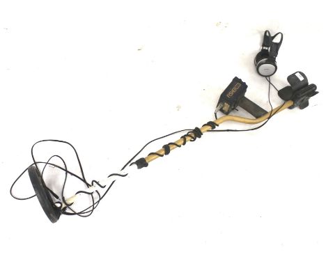 A metal detector, headphones. Fisher M-scope. Model 1265-X, untested Condition Report: It appears to switch on and makes a no