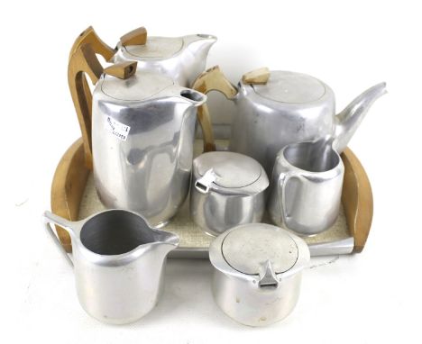 A vintage retro mid 20th Century Picquot Ware coffee/ tea service. Constructed of stainless steel and beech wood, comprising 