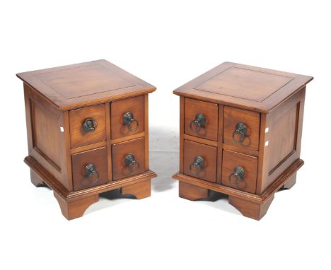A pair of Indonesian hardwood bedside chest of drawers. Raised on bracket supports, H48cm