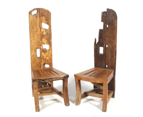 A pair of solid rustic hardwood high back chairs. Possibly reconstituted from a ladder, H132cm