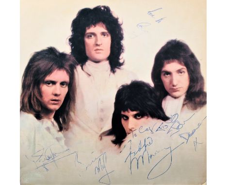 SIGNED QUEEN LP. A copy of Queen - Queen II (EMA 767, Ex/VG+) signed to inner gatefold by Freddie Mercury, Roger Taylor, Bria