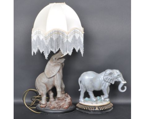 A vintage retro 20th century elephant table lamp / desk lamp. The lamp having a domed shade with glass beaded tassels, the el