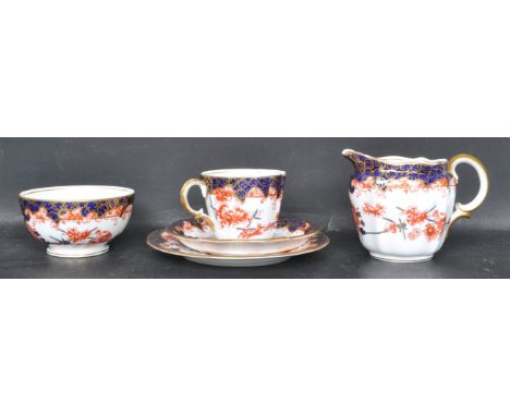 A collection of early 20th century Royal Crown Derby 5852 pattern gilt imari porcelain china comprising of a cup, saucer &amp