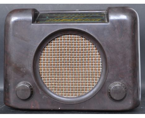 A vintage 20th Century 1940's bakelite Bush radio type DAC. 90 having central round speaker with tuning and volume knob below