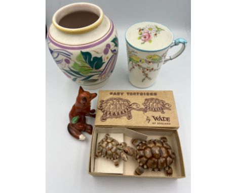 Ceramics to include Wade baby tortoises, Poole vase, Beswick fox and a Royal Paragon China mug to commemorate the birth of Pr