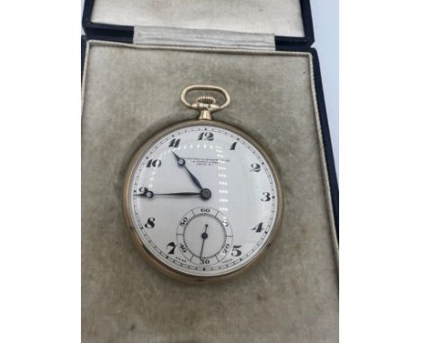 A nine carat gold cased pocket watch with subsidiary seconds dial. Maker Goldsmiths and Silversmiths Co Ltd. In original fitt