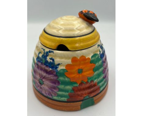 A Clarice Cliff for Wilkinson Pottery Bizarre honey pot in Gayday pattern. 9cm h. 
