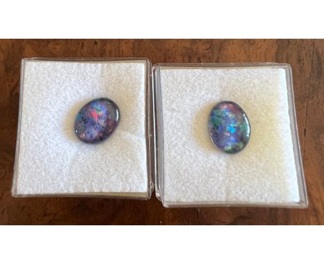 Two unmounted&nbsp; Australian opal doublets. Approximate size 10mm x 6mm.