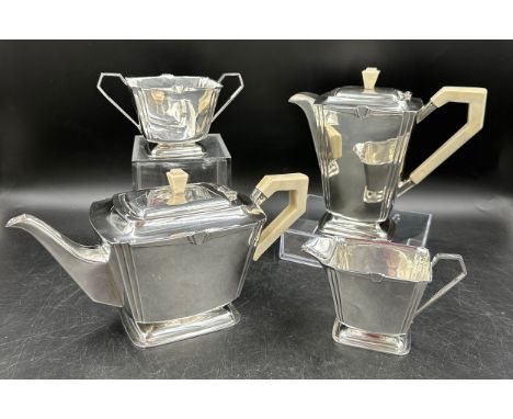 A silver Art Deco four piece tea set comprising coffee pot, teapot, twin handled sugar and jug all hallmarked Sheffield Eugen