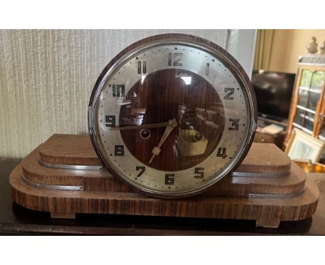 Art Deco mantle clock with chrome mounts. 45cm w x 24cm h. 