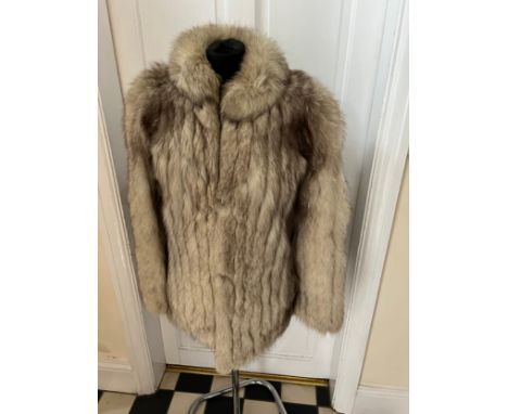 A vintage silver fox fur jacket. Nape to hem 74cm. Armpit to armpit 47cm. 