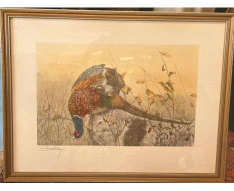 Léon Danchin pencil signed print of a spaniel with a pheasant in its mouth. 55cm x 73cm. 