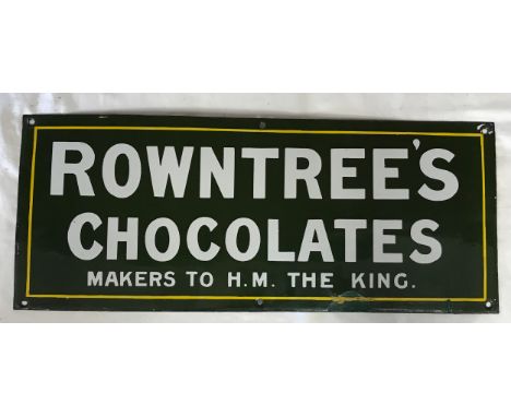 A metal advertising sign reading 'Rowntree's chocolates makers to H.M. the king.' on a green background with a yellow border 