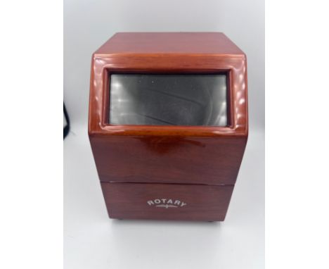 A Rotary watch winder. 18cm h x 13 w x 15cm d. Working condition. 