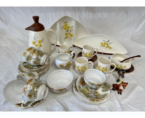 An assortment of ceramics to include Carlton Ware Mimosa lidded jug 25cm h, 4x beakers, 2x saucers, plated sauce dish and lad