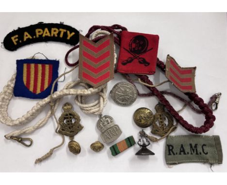 A collection of medical corps army badges to include F.A. Party, St John Ambulance&nbsp; Association, A.R.P, R.A.M.C., 19thC 
