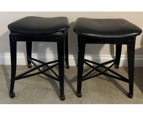 Pair of metal stools measuring approx 43cm h x 35cm w with leather tops, circa 1930's. Originally from Rubery Owen factory es