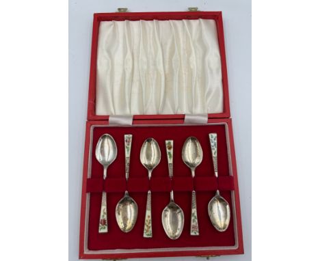 A boxed set of 6 silver and floral enamel coffee spoons. Birmingham 1972, maker WW Godwin and Son Ltd. Weight 50gm. 
