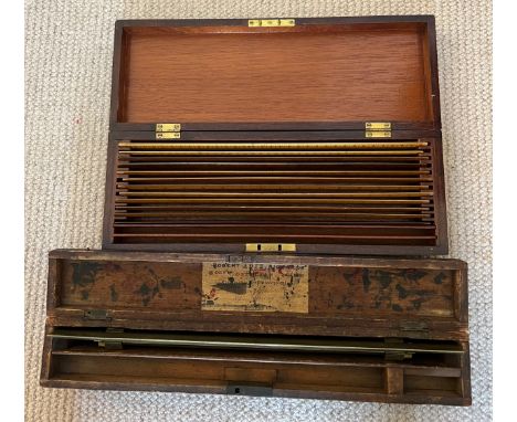 Nineteenth century boxed tools to include a brass rolling parallel rule in fitted case by Adie London and a boxed collection 