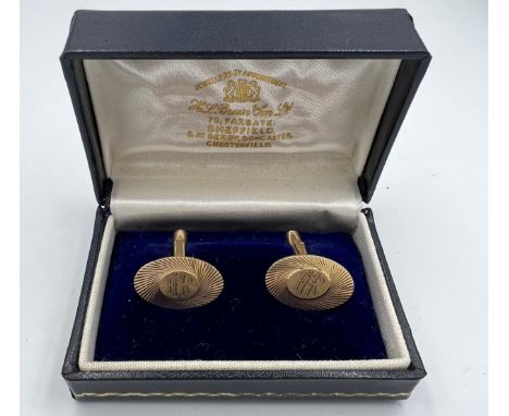Boxed 9 carat gold cuff links, weight 7.5gm. R H initials to front. 