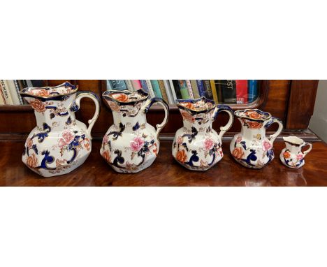 Five graduated Masons Mandalay pattern jugs together with a Masons Mandalay lamp 40cm h. 
