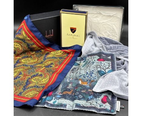 Two silk boxed handkerchiefs, one Dunhill with a paisley pattern 44 x43cm  the other from Aspinall of London depicting a wood