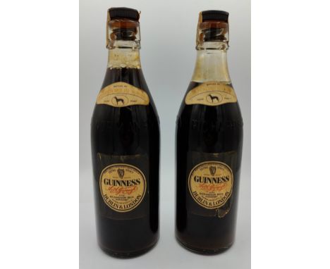 Two vintage bottles of Guinness bottled by Richardson Bros LTD Normanby, minimum contents 19 1/3 fl.oz 26cm h. 