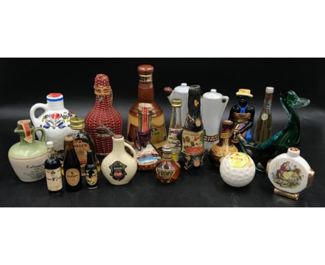 A collection of novelty miniatures to include, a coloured glass Murano duck with Drioli contents sealed inside, woven Rynbend