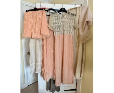 Vintage undergarments to include: five slips one a Christian Dior slip with Harrods Ltd London label in black and pale pink, 