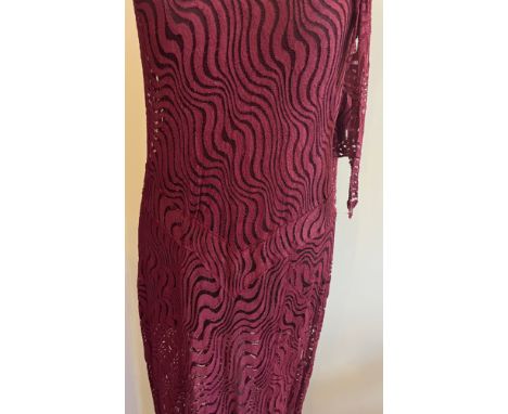 A sleeveless burgundy 1930s bias cut evening gown with matching scarf and detail to back. Measures shoulder to bottom hem 139