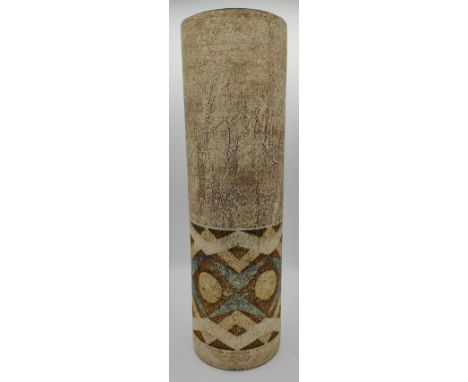 Large cylindrical Troika vase signed by Tina Doubleday to base, decorated with brown, white and blue geometric shapes to lowe