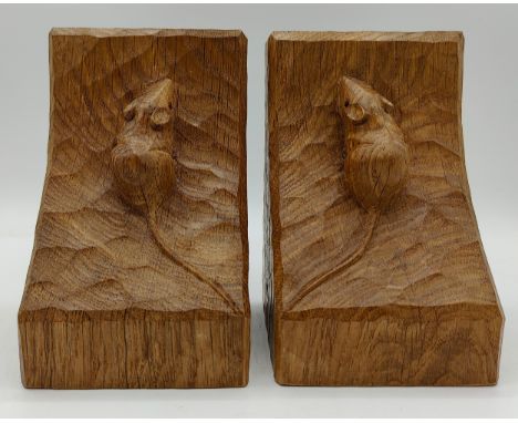 Robert 'Mouseman' Thompson a pair of Mouseman bookends, each with adzed surface and carved mouse signature, along with offici