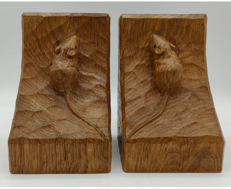 Robert 'Mouseman' Thompson a pair of Mouseman bookends, each with adzed surface and carved mouse signature, along with offici