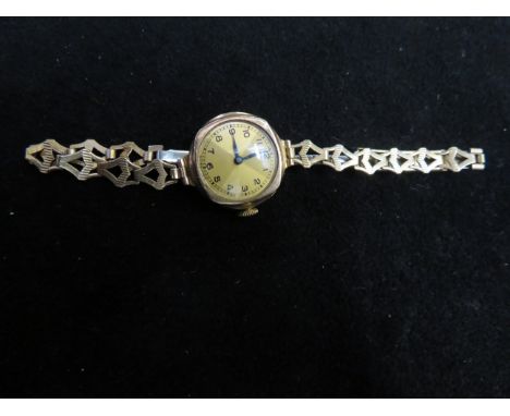 Ladies vintage 9ct Gold cased wristwatch, yellow metal bracelet tested for high carat gold, currently ticking 