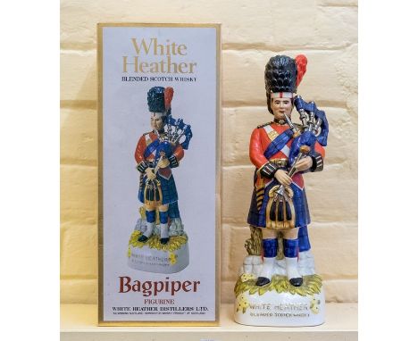 ***ITEM LOCATED AT BISHTON HALL***&nbsp;White Heather Blended Scotch Whisky in Bagpiper Decanter in original box. Note: Busby