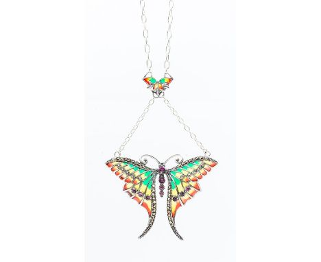 A silver and plique a jour butterfly pendant, the body set with ruby, the wings set with rubies and maracsite stones, size ap