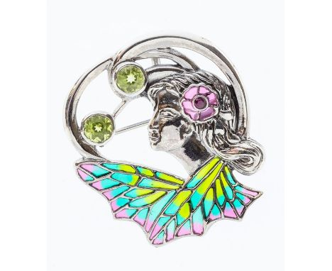 A plique a jour silver and enamel brooch/pendant in the form of an Art Nouveau lady, her hair adorned by an enamel flower set