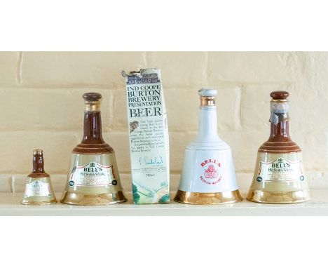 ***ITEM LOCATED AT BISHTON HALL***A collection of assorted Bells Whisky Decanters, as well as a number of Ind Coope Beers.&nb